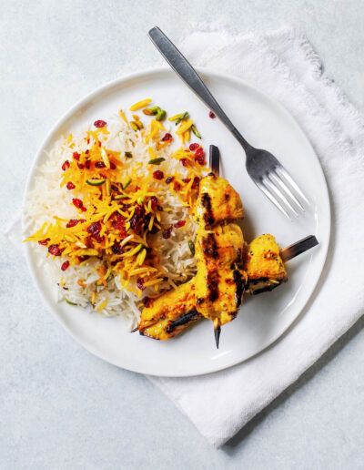 White or brown basmati rice served with butter fried barberries and saffron