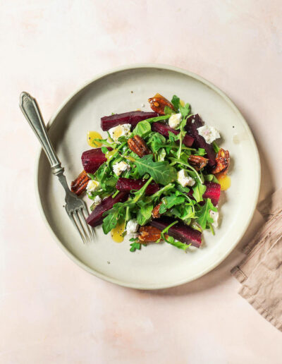 Seasonal beet salad with goat cheese and caramelized pecans